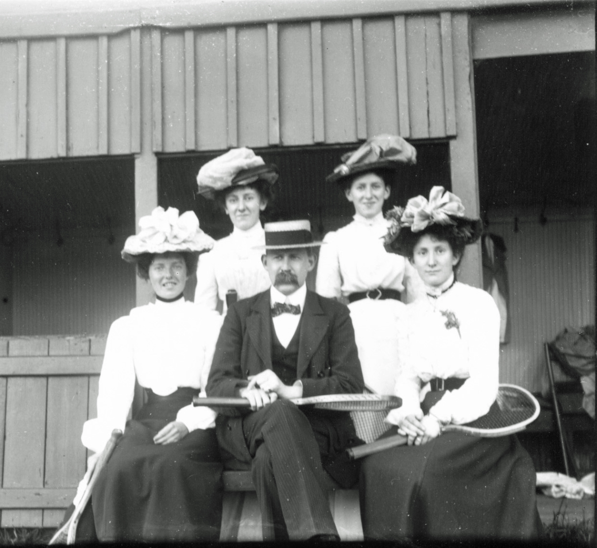 Ladies tennis team with hats and long skirts